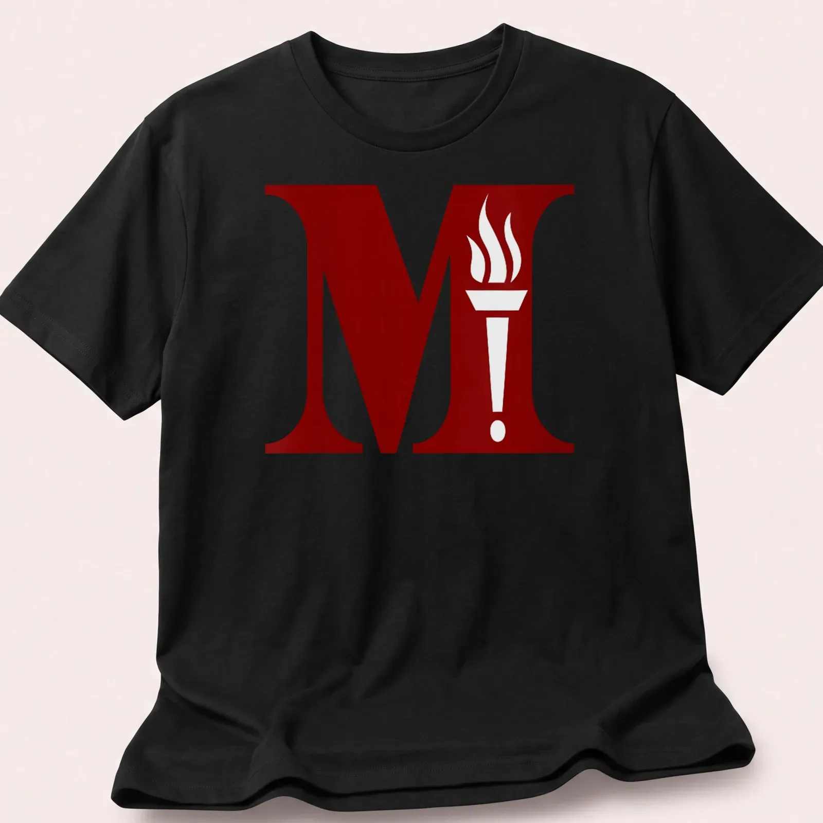 Bold graphic of a torch emblem with the letter M in red and white — printed on a unisex t-shirt