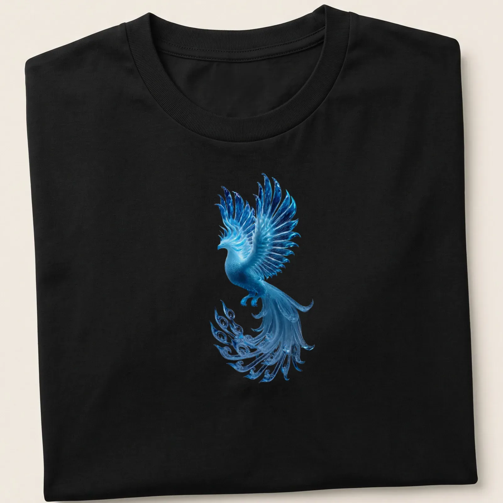 Illustration of a glowing blue ice phoenix with shimmering feathers in blue, cyan, and teal — printed on a unisex t-shirt