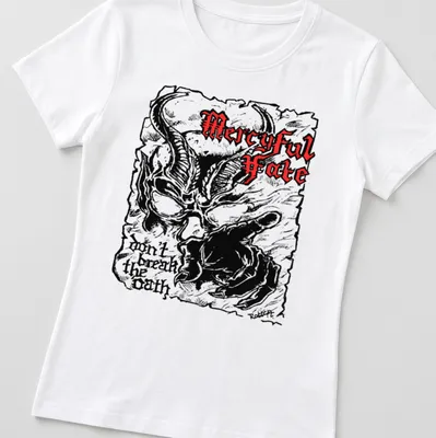 Demonic figure with horns and text on a black, red, and white design — printed on a women's shirt