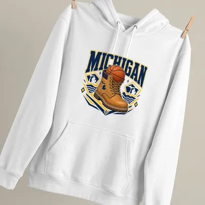 Bold graphic of a work boot and basketball with Michigan text — printed on a unisex hoodie
