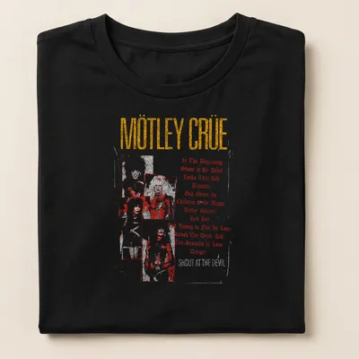 Vintage distressed Mötley Crüe shirt with band members and song titles in black, red, white, and gold — printed on a women's shirt