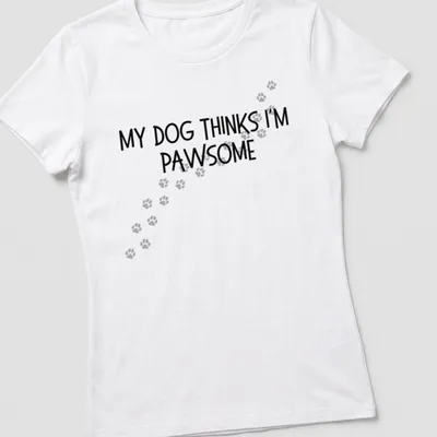 Funny t-shirt featuring the phrase My Dog Thinks I'm Pawsome with paw prints — printed on a women's shirt