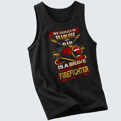 Vintage firefighter t-shirt with bold text and helmet graphic in red, orange, yellow, and black — printed on a tank top