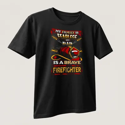 Vintage firefighter t-shirt with bold text and helmet graphic in red, orange, yellow, and black — printed on a unisex t-shirt (angled view)