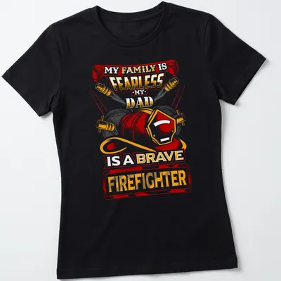 Vintage firefighter t-shirt with bold text and helmet graphic in red, orange, yellow, and black — printed on a women's shirt