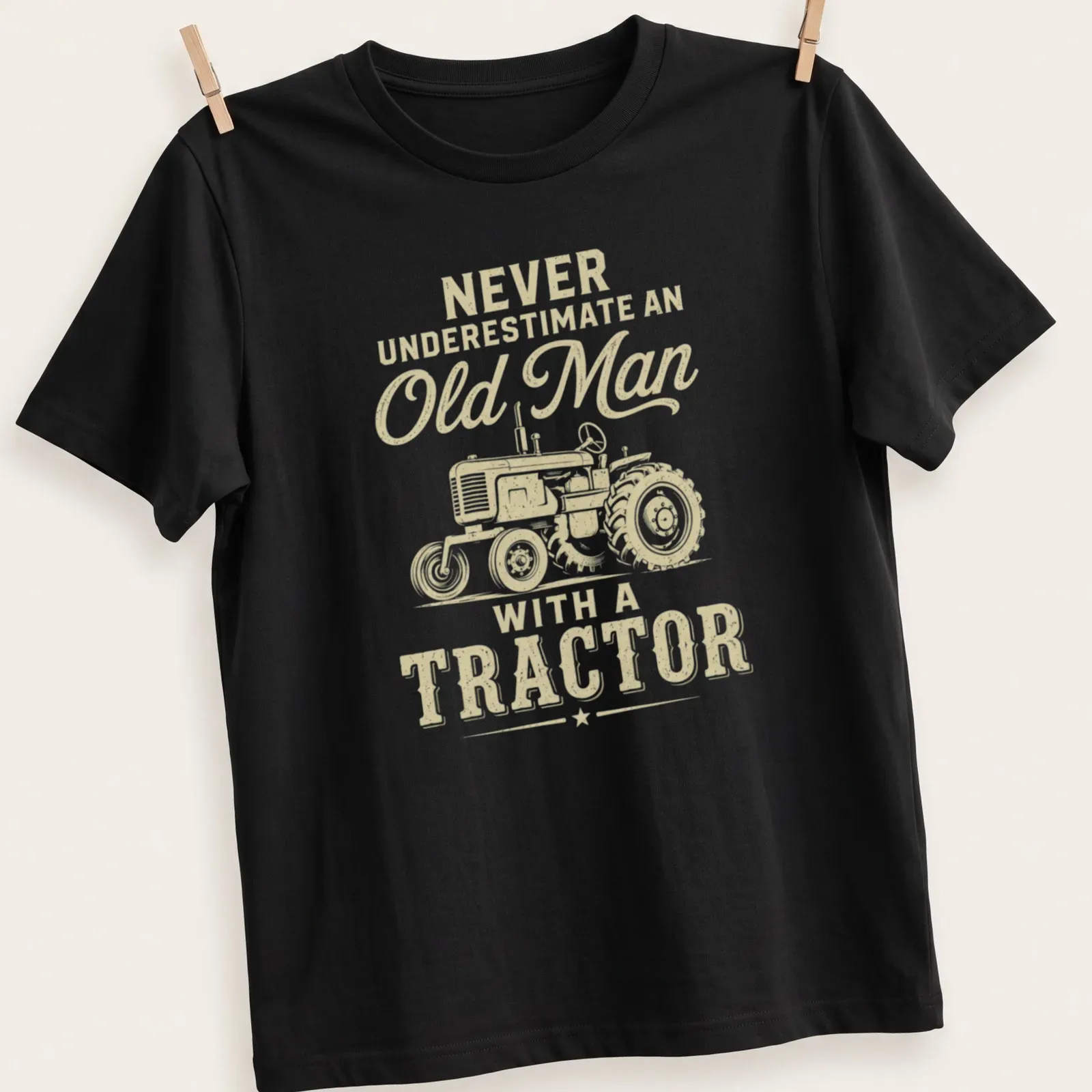 Vintage tractor graphic with humorous text about old men and tractors — printed on a unisex t-shirt