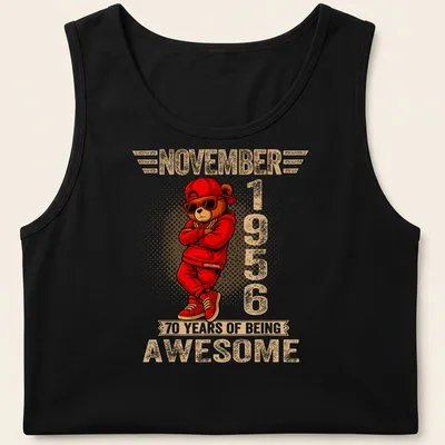 Cartoon teddy bear with colorful text celebrating 70 years of being awesome — printed on a tank top