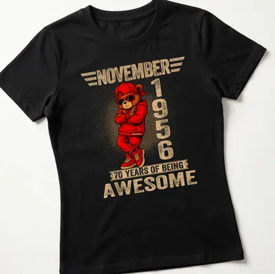 Cartoon teddy bear with colorful text celebrating 70 years of being awesome — printed on a women's shirt