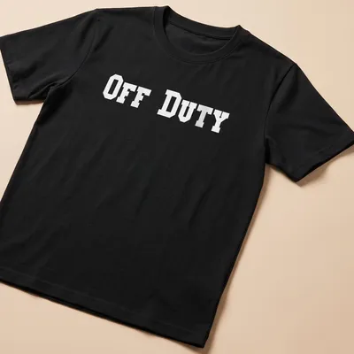 Bold typography t-shirt saying 'OFF DUTY' in large letters.