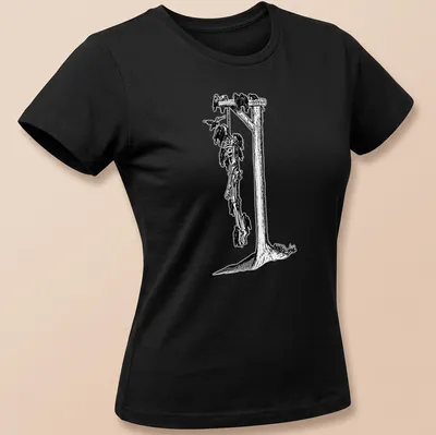 Detailed black and white illustration of a skeleton hanging from a gallows, with printed text above. — printed on a women's shirt