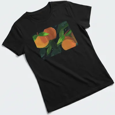 Vibrant painting of oranges with green leaves and black outlines — printed on a women's shirt