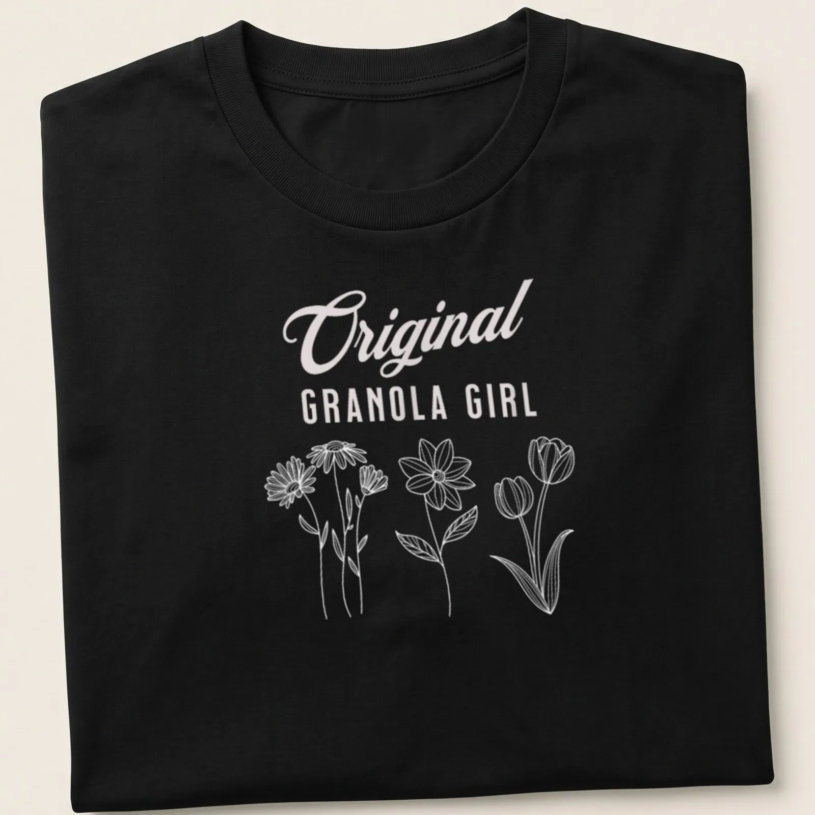 Minimalist line-art floral design with 'Original Granola Girl' text in pink — printed on a unisex t-shirt
