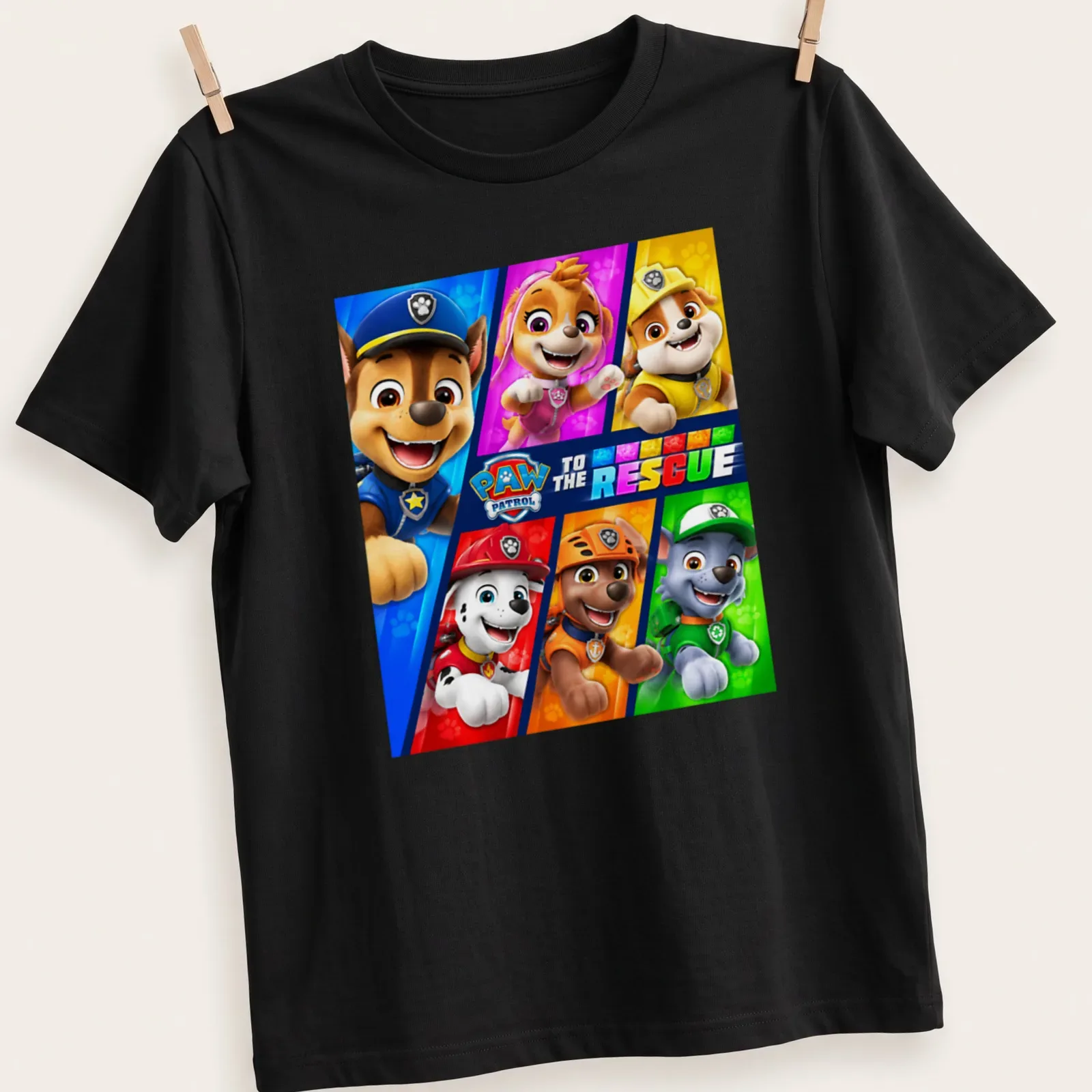 Colorful cartoon Paw Patrol characters with text 'To The Rescue' on — printed on a unisex t-shirt