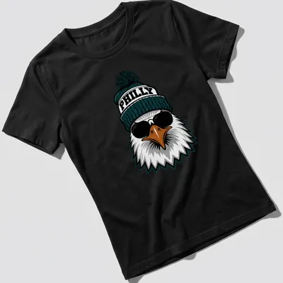 Cartoon-style Philly eagle in sunglasses and hat with the word PHILLY — printed on a women's shirt