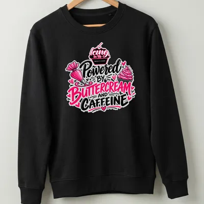 Colorful t-shirt with playful text about baking and caffeine in pink and black — printed on a unisex sweatshirt