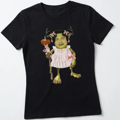 Cartoon goblin with piggytails in green, pink, brown, and white — printed on a women's shirt