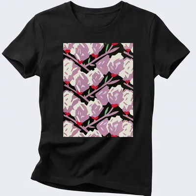 Bold graphic floral roses in purple, red, white, and green on black — printed on a women's shirt