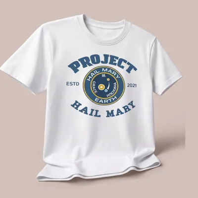 Vintage style t-shirt with a space mission emblem in navy, gold, and white. — printed on a unisex t-shirt (angled view)