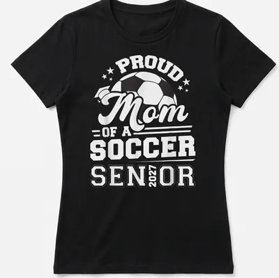 Bold typography celebrating Proud Mom of a Soccer Senior 2027 with a soccer ball — printed on a women's shirt