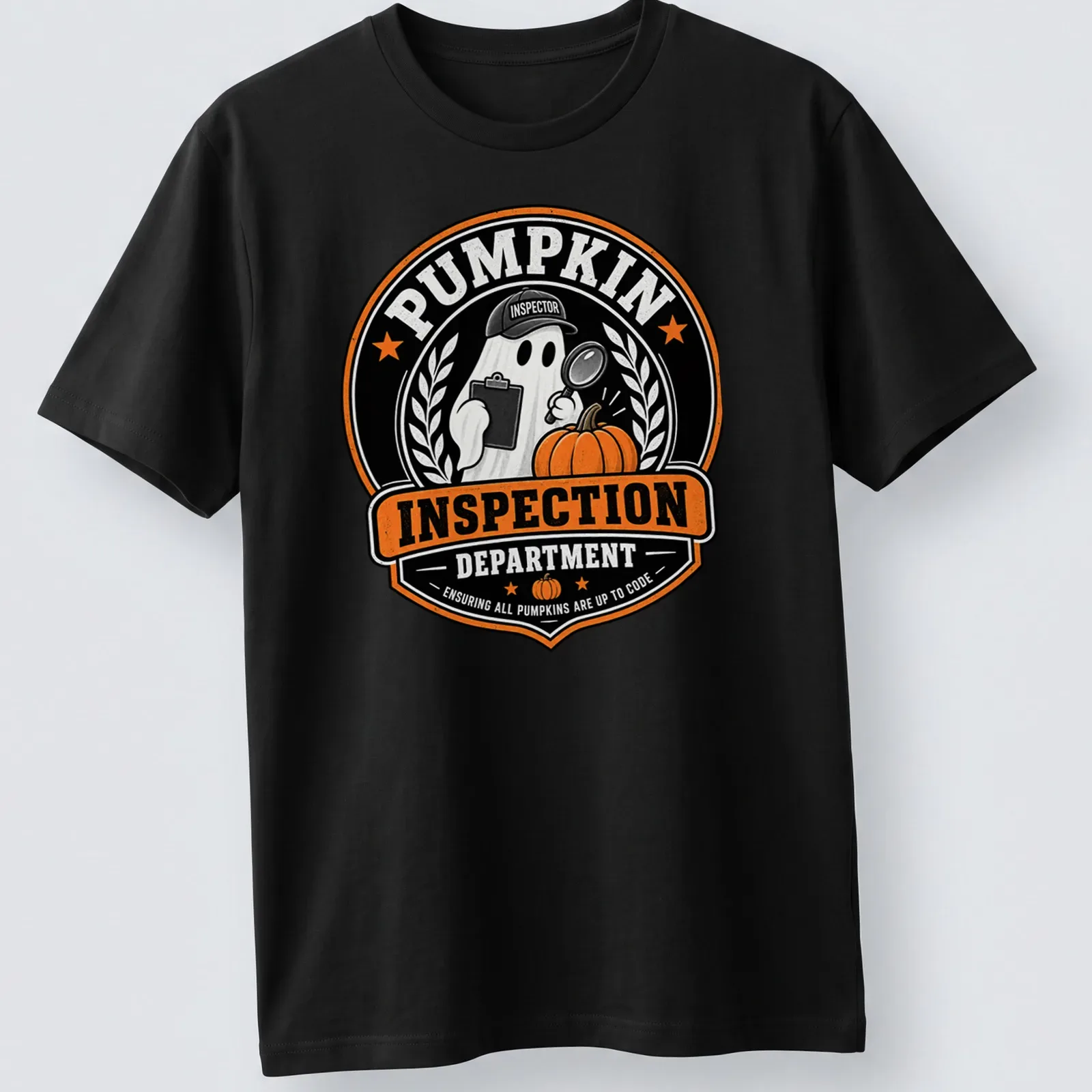 Vintage badge style Pumpkin Inspection T-shirt featuring a ghost with a magnifying glass inspecting a pumpkin. — printed on a unisex t-shirt