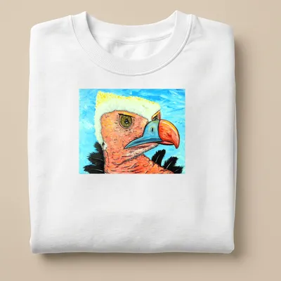 Realistic portrait of a quizzical vulture against a blue sky background — printed on a unisex sweatshirt