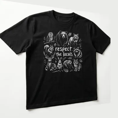 Illustrative design featuring forest wildlife with the text 'respect the locals' — printed on a unisex t-shirt (angled view)