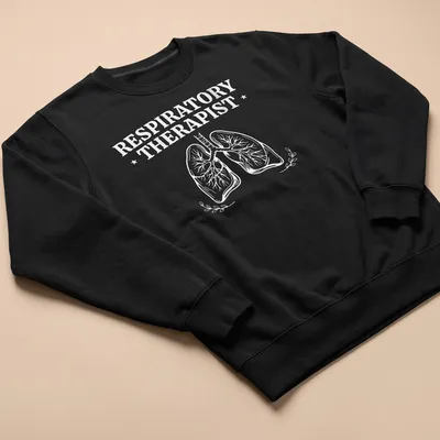 Vintage-inspired t-shirt with graphic text reading 'Respiratory Therapist' and lungs illustration. — printed on a unisex sweatshirt