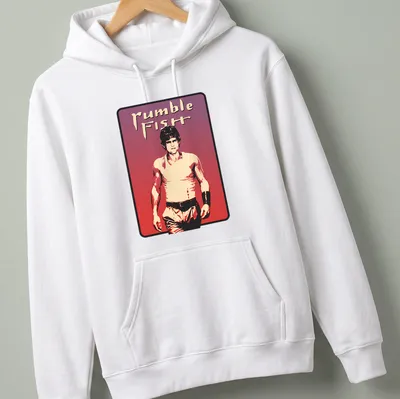 Vintage aesthetic t-shirt featuring Rumble Fish character and text in bold font — printed on a unisex hoodie