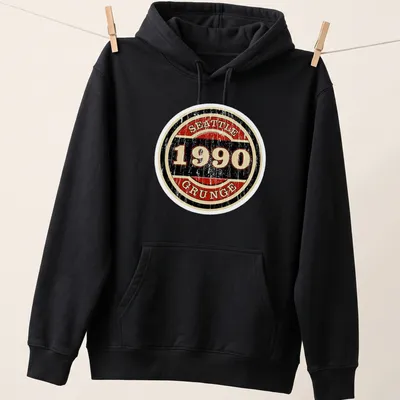 Retro distressed Seattle 1990 Grunge t-shirt with bold badge graphic — printed on a unisex hoodie