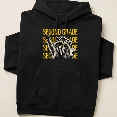 Bold cartoon of a raccoon holding a pencil and coffee with text saying 'SECOND GRADE' — printed on a unisex hoodie