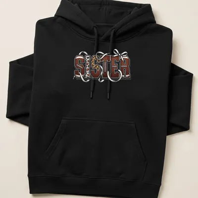 Retro leopard print tee featuring 'SISTER' with football elements and bows. — printed on a unisex hoodie