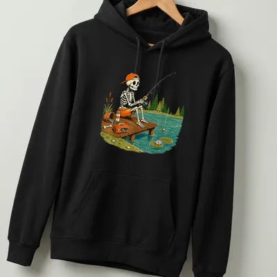 Cartoon skeleton fishing on a dock in vintage style with autumn colors — printed on a unisex hoodie