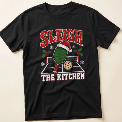 Vintage distressed Christmas shirt with 'Sleigh The Kitchen' and a pickleball paddle wearing a Santa hat