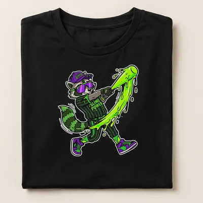 Cartoon raccoon swinging a bat with 'Slime Power' text in vibrant colors — printed on a women's shirt