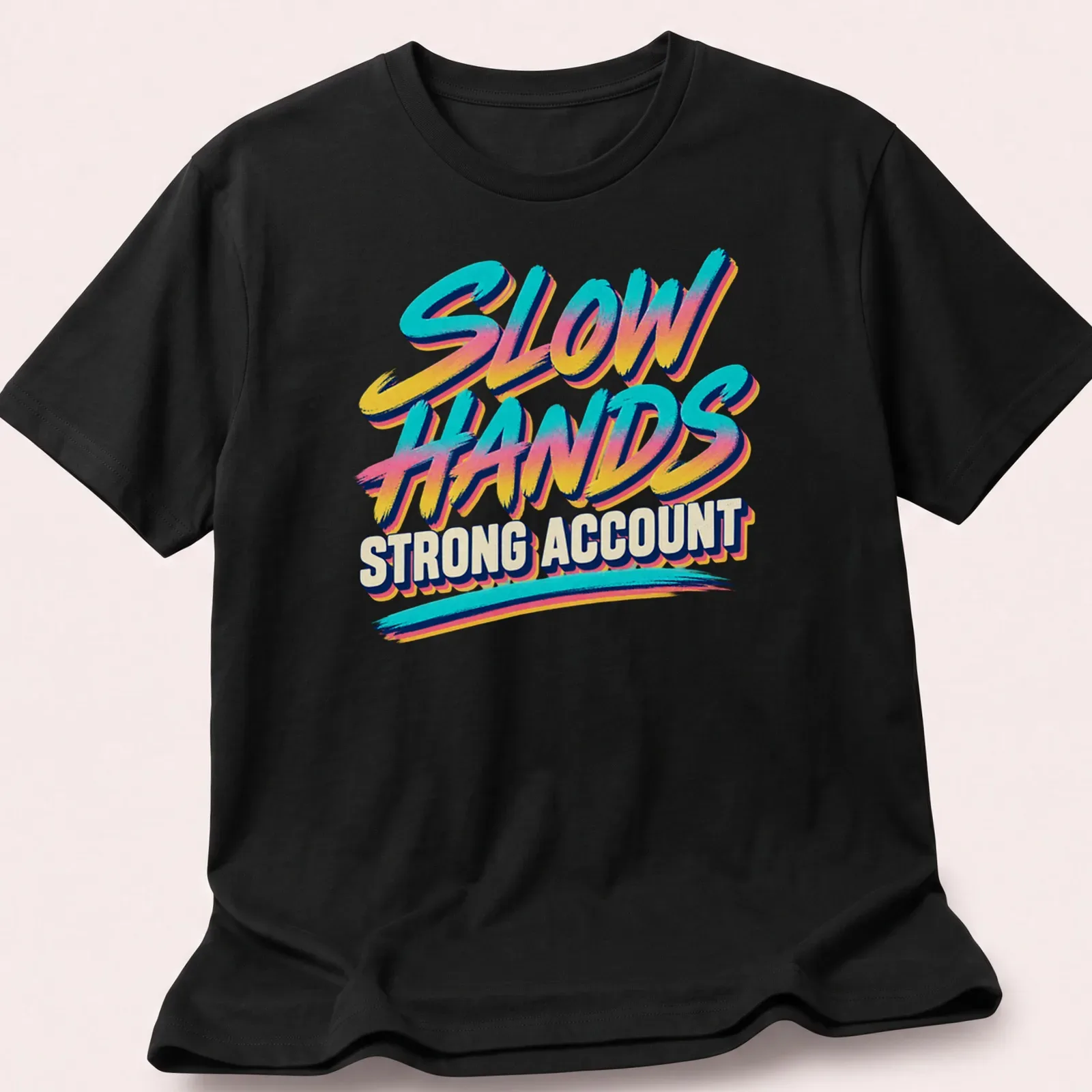 Retro text design featuring the phrase Slow Hands Strong Account in blue, pink, yellow, and white — printed on a unisex t-shirt