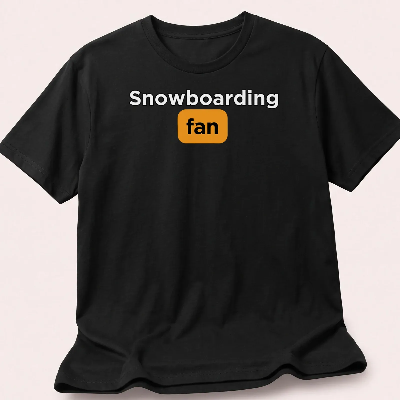Bold typography Snowboarding Fan t-shirt in black, orange, and white — printed on a unisex t-shirt