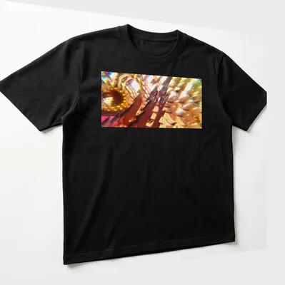 Vibrant digital art of an abstract floral design in yellow, orange, red, gold, and brown. — printed on a unisex t-shirt (angled view)