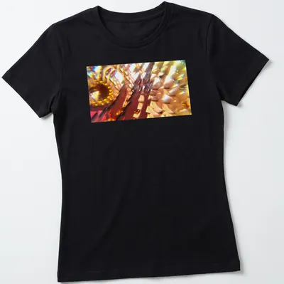 Vibrant digital art of an abstract floral design in yellow, orange, red, gold, and brown. — printed on a women's shirt