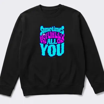 Bold colorful t-shirt with the phrase 'Sometimes it ACTUALLY is ALL ON YOU' — printed on a unisex sweatshirt