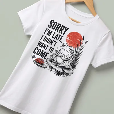 Vintage-style tee featuring a frog on a lily pad with humorous late arrival text. — printed on a women's shirt
