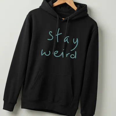 Playful handwritten text 'stay weird' in teal on a t-shirt. — printed on a unisex hoodie