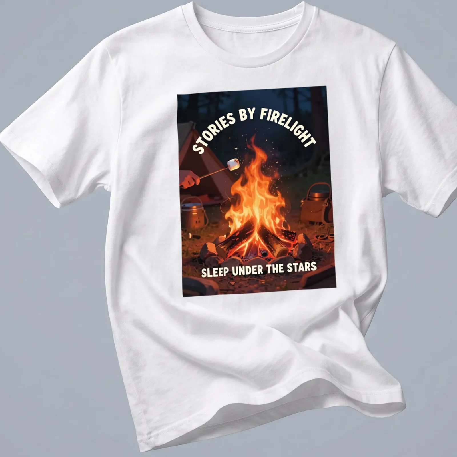 Cozy campfire illustration with the printed text about stories by firelight and sleeping under the stars. — printed on a unisex t-shirt
