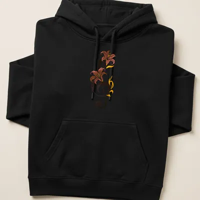 Whimsical illustration of a musical note surrounded by colorful flowers — printed on a unisex hoodie