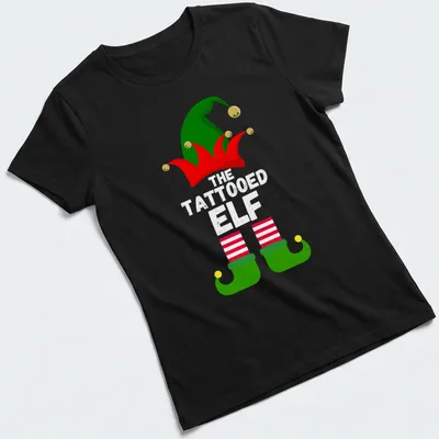 Cartoon elf hat and shoes in festive colors of red, green, yellow, and white — printed on a women's shirt