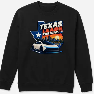 Bold graphic of a self-driving car with Austin skyline and text Texas Leads the Way — printed on a unisex sweatshirt