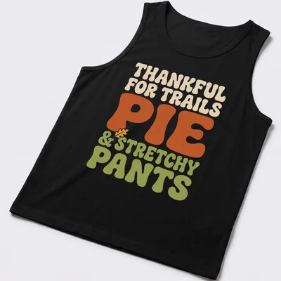 Text-based design celebrating trails, pie, and stretchy pants in retro bold font — printed on a tank top