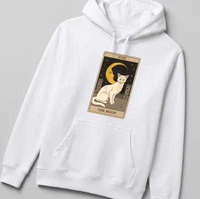 Vintage tarot design featuring a white cat with the text XVIII THE MOON — printed on a unisex hoodie