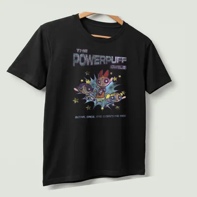 Colorful cartoon design featuring the Powerpuff Girls and the phrase about their qualities. — printed on a unisex t-shirt (angled view)