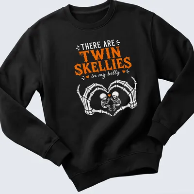 Playful Halloween shirt with twin skeletons and fun text in orange and white — printed on a unisex sweatshirt