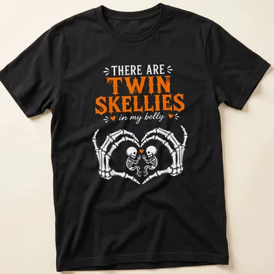 Playful Halloween shirt with twin skeletons and fun text in orange and white